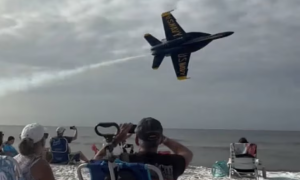 US fighter jet performs low pass, mere meters from spectators' heads