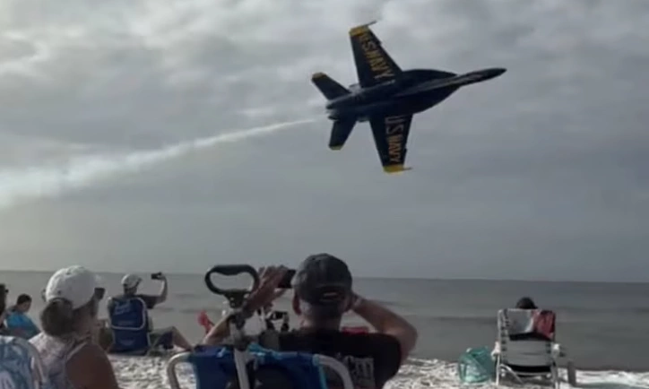 US fighter jet performs low pass, mere meters from spectators' heads