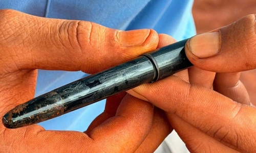 Pen engraved 'Tien Quy' found in martyrs' mass grave