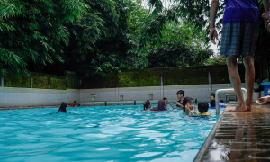 What diseases can spread when swimming together?