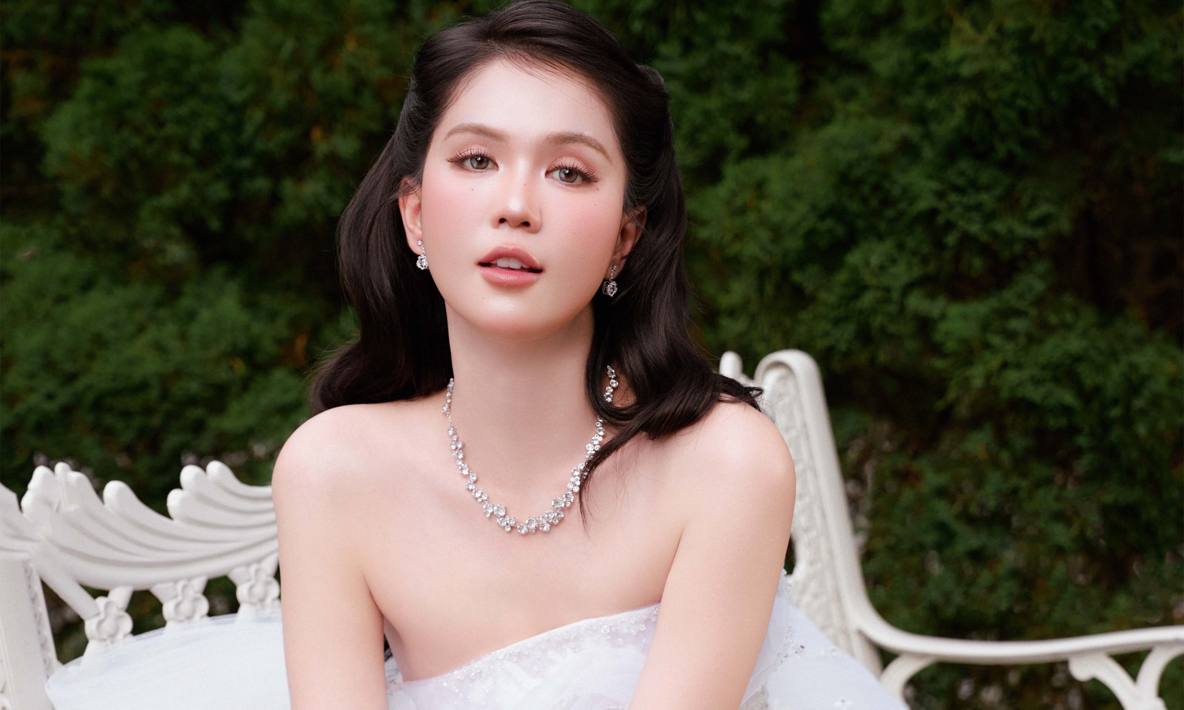 Ngoc Trinh poses in sheer wedding gowns