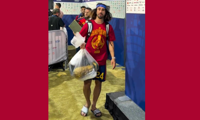 Spanish defender carries World Cup trophy in plastic bag