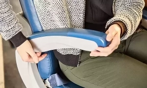 The secret button for extra space on airplane seats