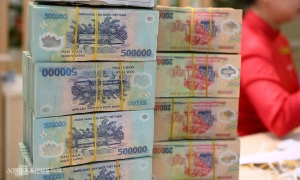Prosecution in absentia of former bank branch director in 15-year-old fraud case