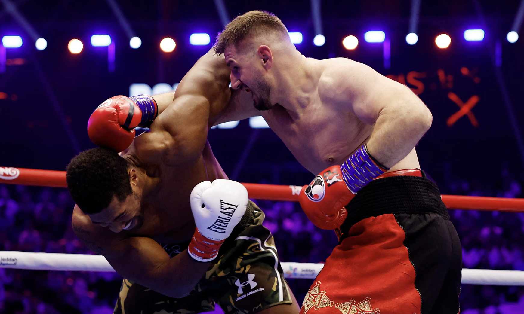 Joshua knocked down after 20 seconds, still wins by knockout