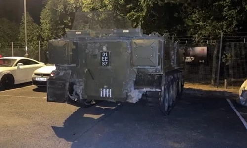 Drunk British soldiers drive armored vehicle, damage parked cars