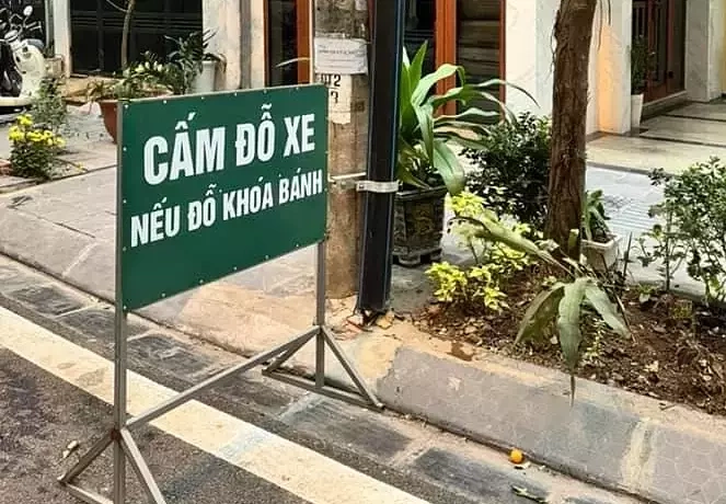 It is very difficult to ban parking in front of private homes