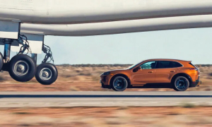 Porsche electric car pursues massive aircraft during takeoff