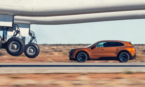 Porsche electric car pursues massive aircraft during takeoff
