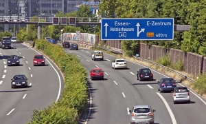 What constitutes 'continuous driving' in the left highway lane?