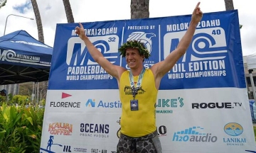 Shark attack rescuer wins fourth consecutive paddleboard world championship