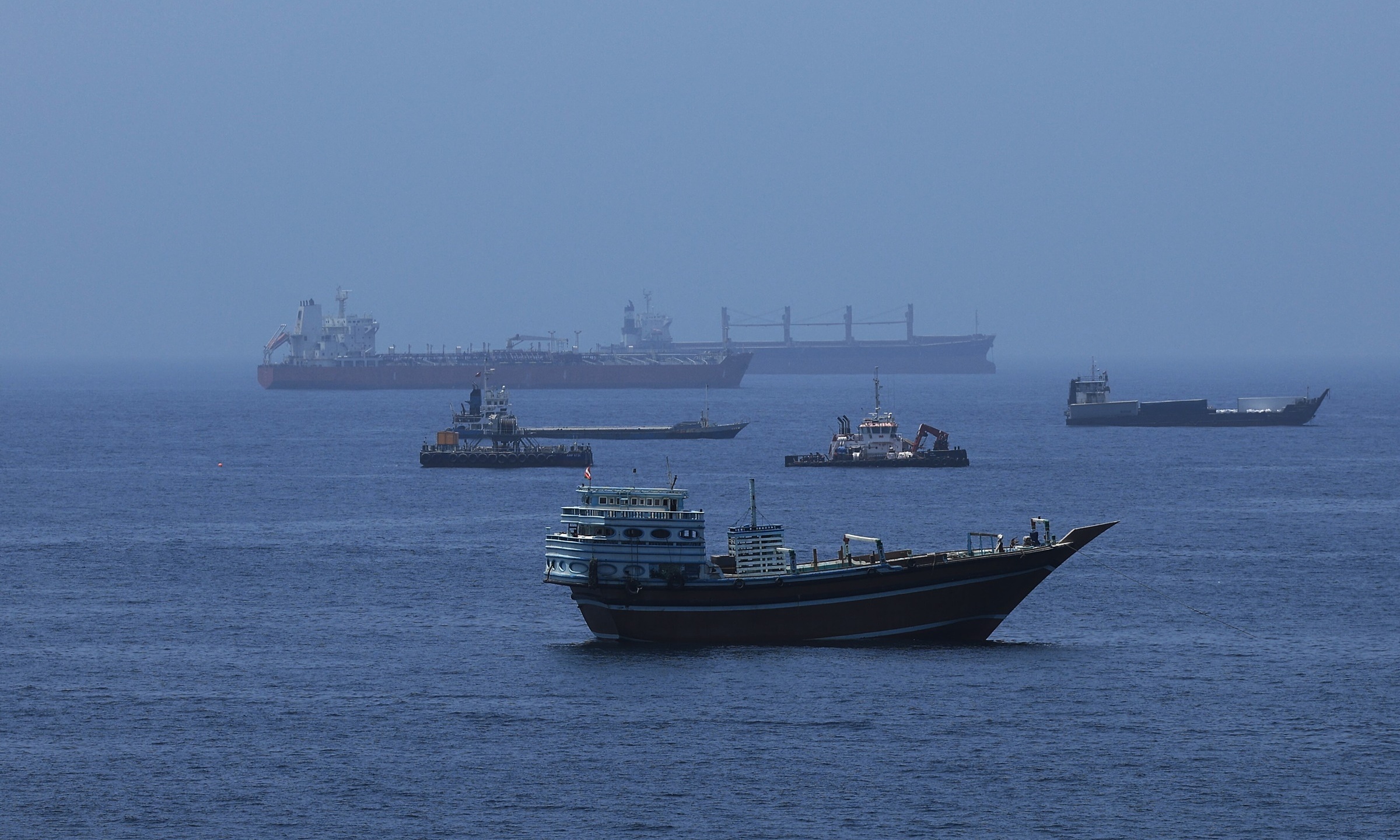 Iran claims attack on US-escorted oil tankers in Strait of Hormuz