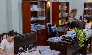 Civil servants processing administrative documents must work an extra 30-40 hours each month