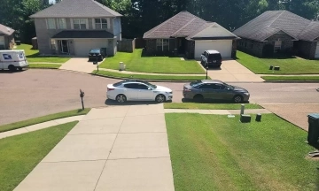 How do countries handle cars parked in front of residential properties?