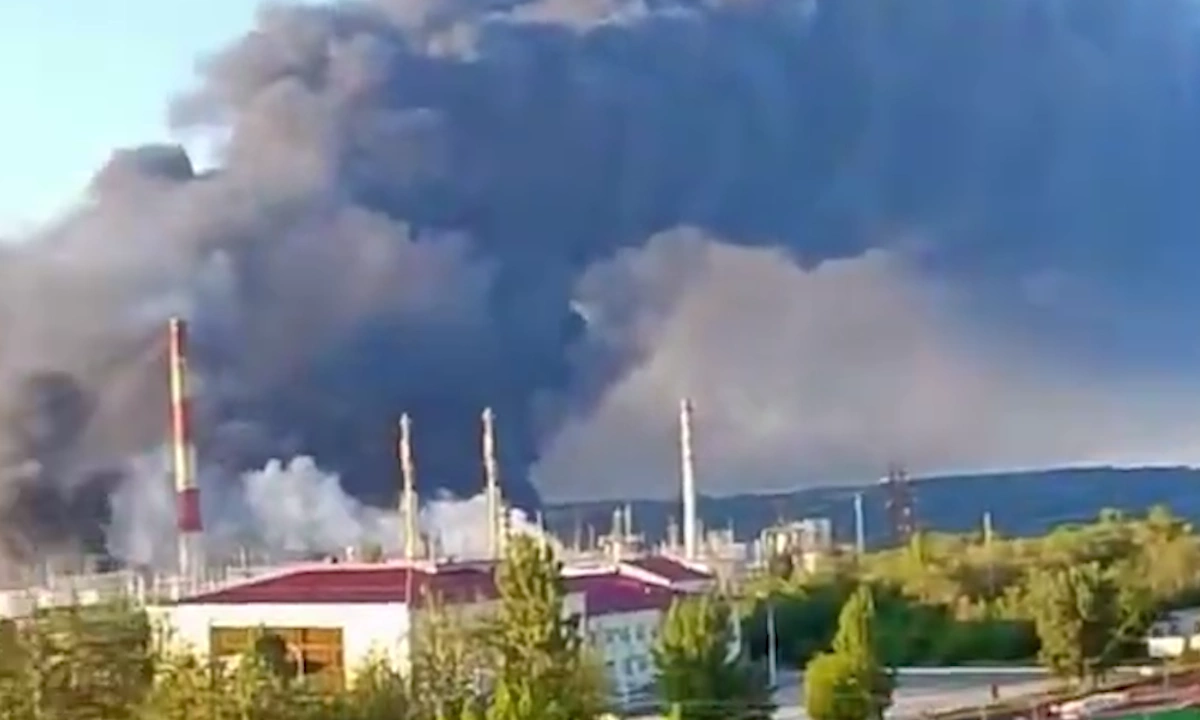 Ukraine launches hundreds of drones to attack Russian oil refinery, strategic airbase