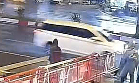 Car driver crashes through railway barrier in Ho Chi Minh City