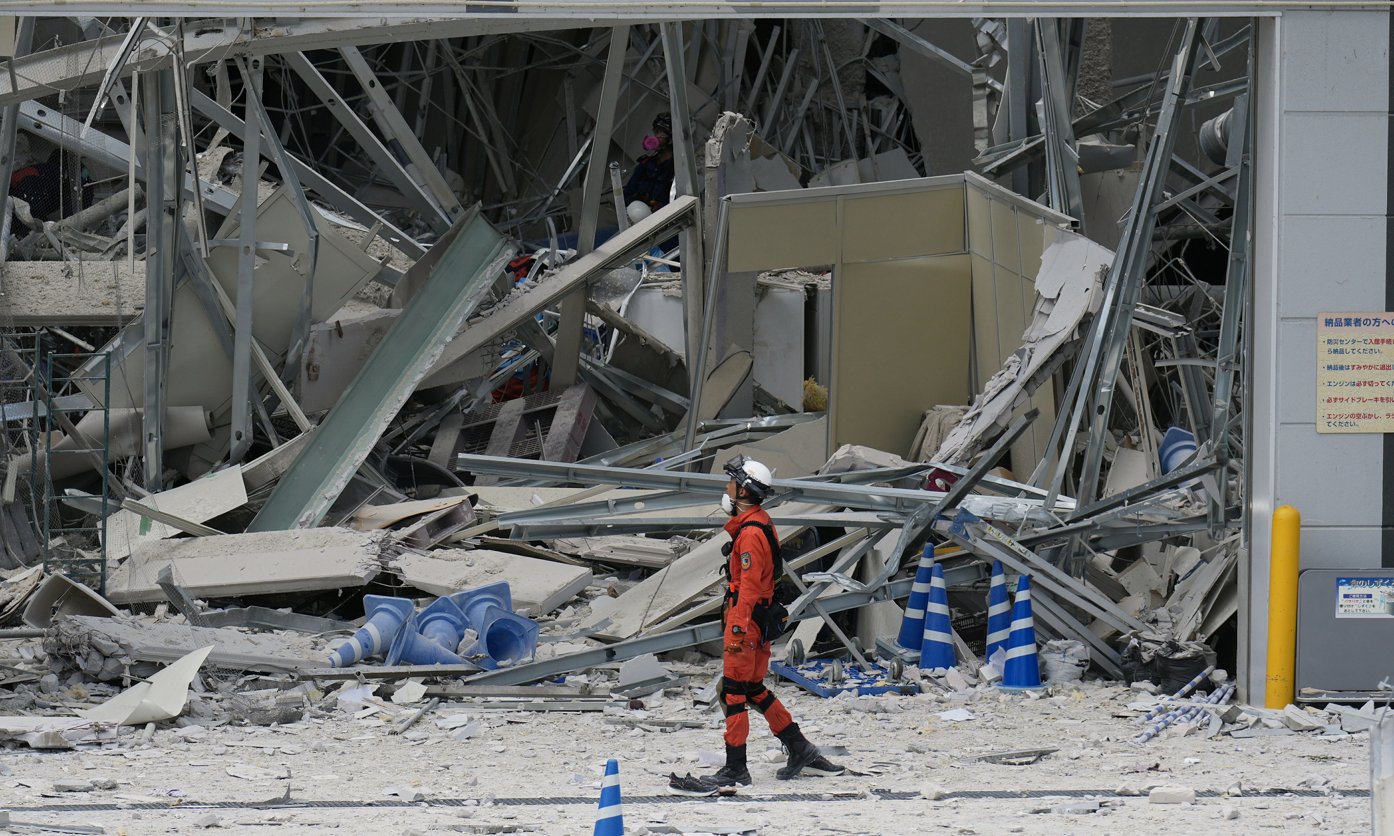 Two employees die after being ordered to retrieve cash following earthquake