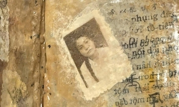 Photo of a woman found in unidentified martyr's grave