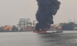 Barge fire on Saigon river leaves one dead