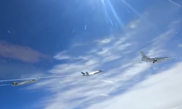 China releases video of bomber carrying heavy ballistic missile