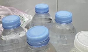 Grocery store owner fined for selling refilled water in used bottles outside hospital