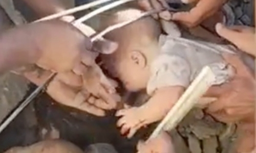 Faint cry from rubble saves baby after Colombia earthquake