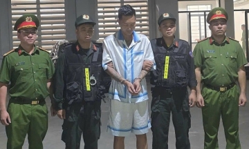 Why was Huan Hoa Hong arrested?