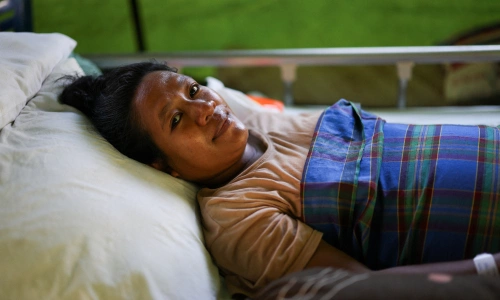 A mother recounts the moment of giving birth during a 7.7-magnitude earthquake