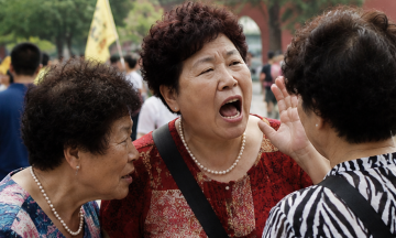 Why Chinese people speak loudly in public