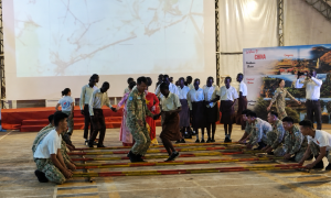 Vietnamese soldiers and African students share traditional bamboo dance