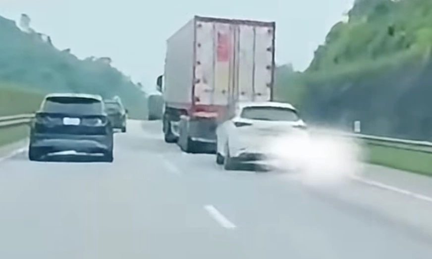 Driver fined for 'tucking in' behind container truck on highway