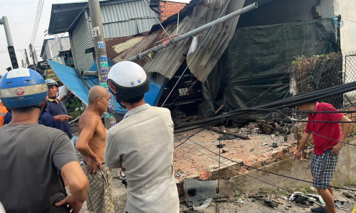 Car crashes into house after fatally striking motorcyclist