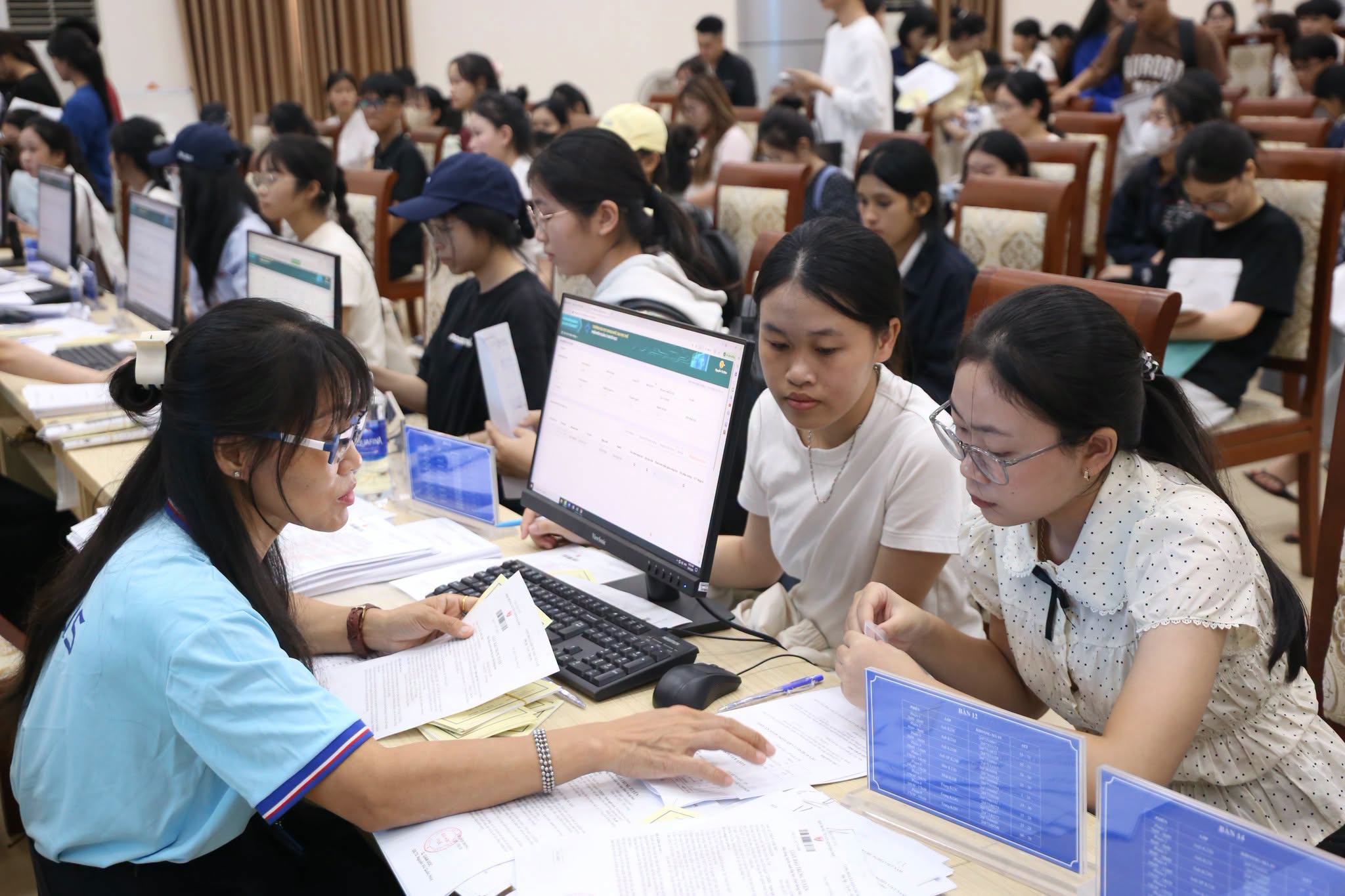 Holding acceptance letters, students learn of university rejection upon arrival