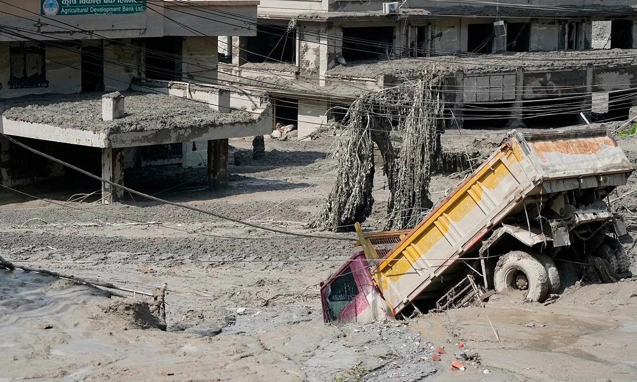 Moment a tsunami-like flash flood swept through the China - Nepal border crossing