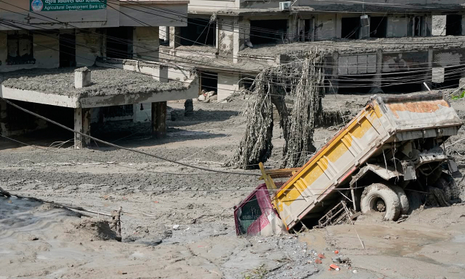 Moment a tsunami-like flash flood swept through the China - Nepal border crossing