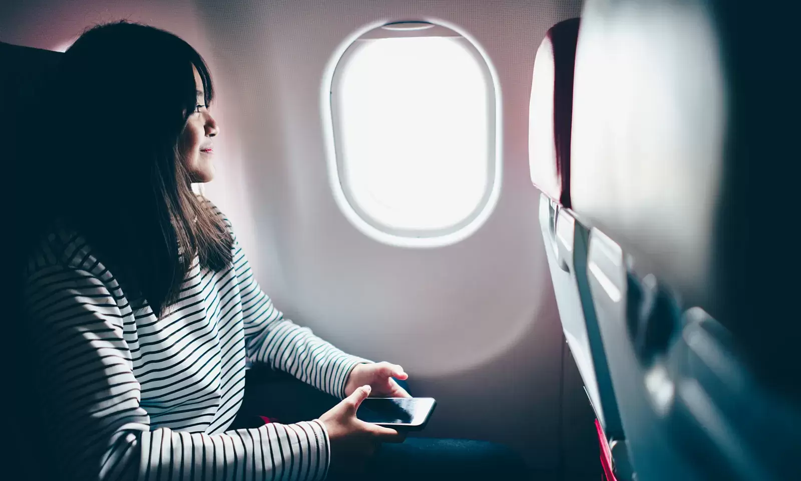 who is allowed to close and open airplane window shades?