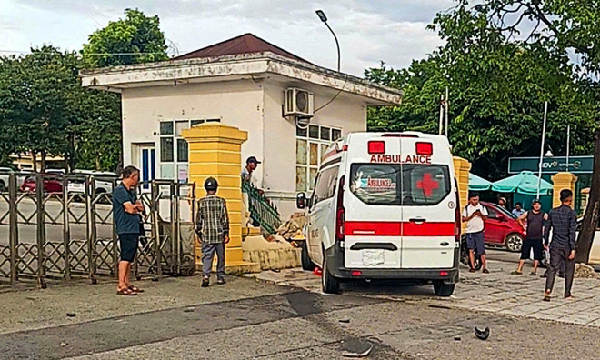 Ambulance crashes into hospital fence