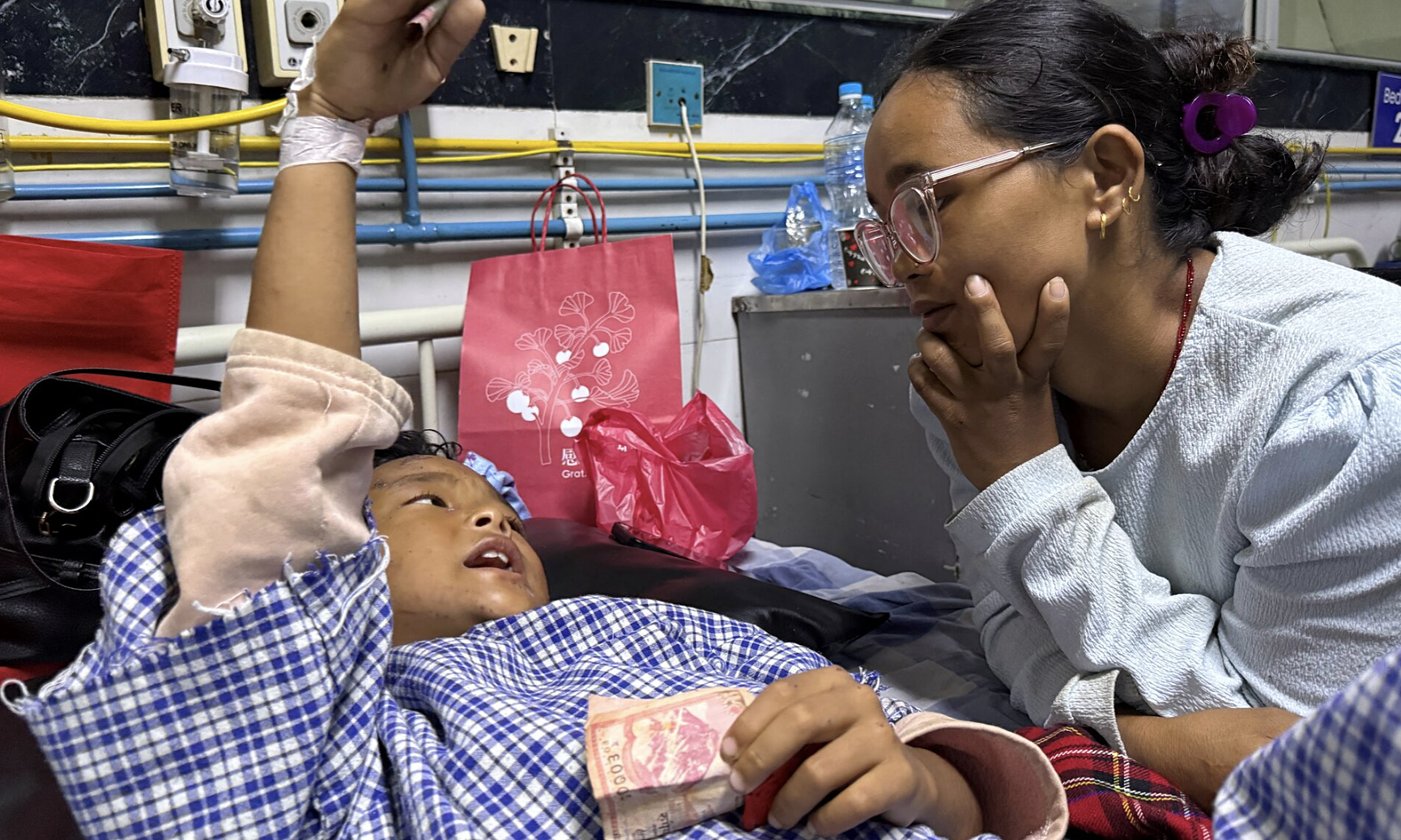 8-year-old boy climbs tree to escape flash flood in Nepal