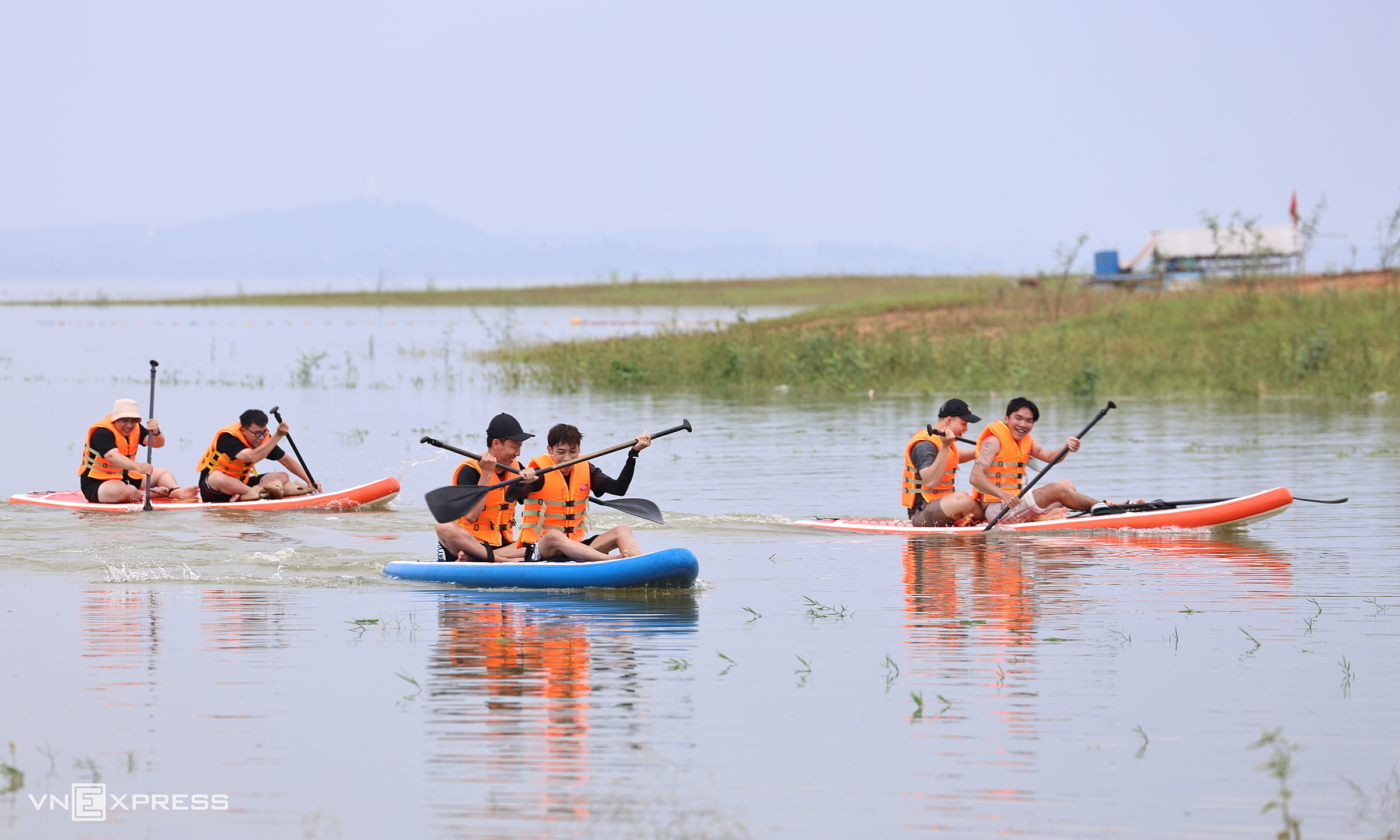 SUP paddling on Tri An lake during low water conditions