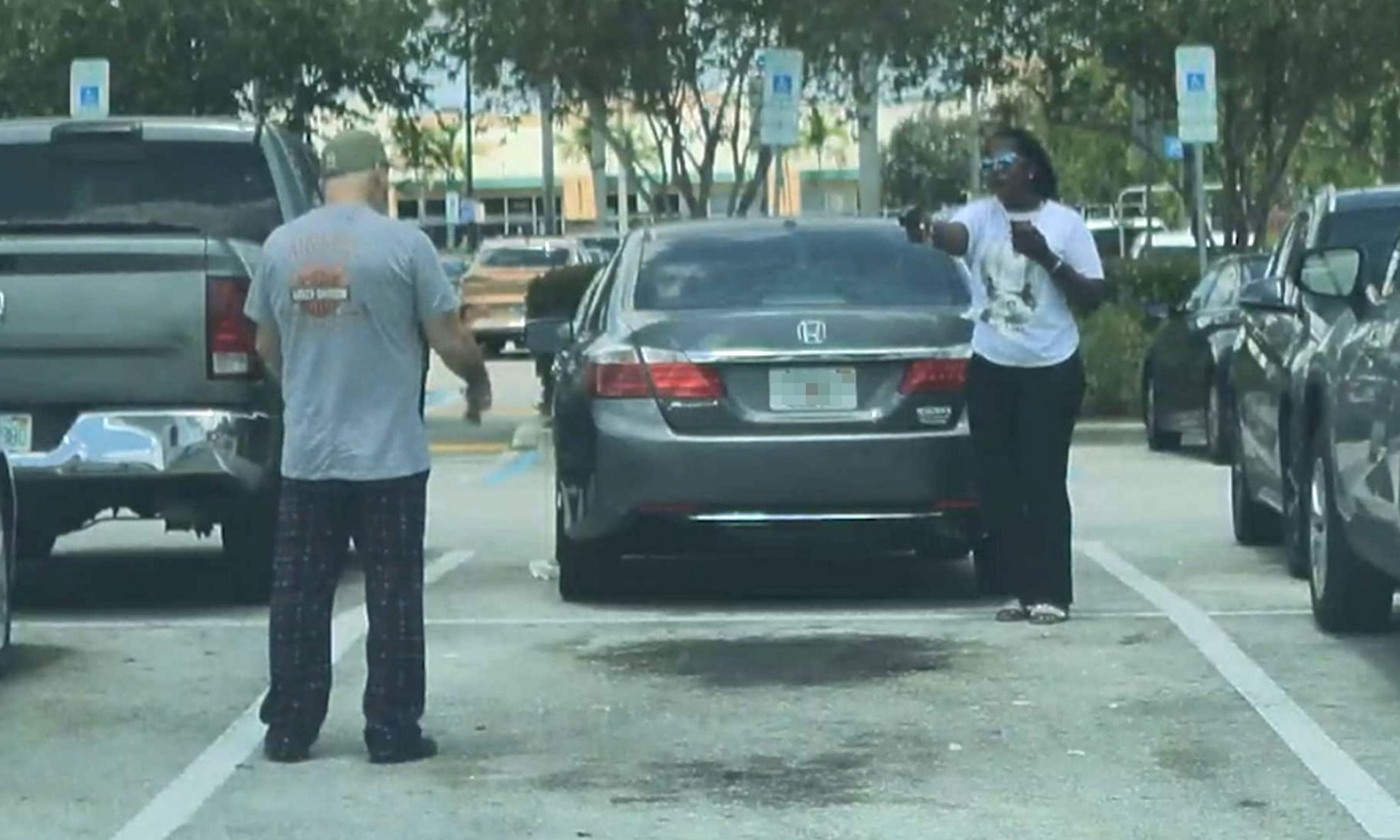 American woman shoots after supermarket parking dispute