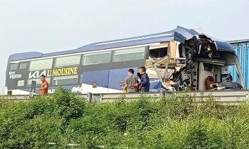 Passenger bus crashes into tractor-trailer, one dead