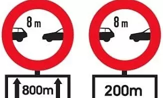 Two minimum distance signs often confuse drivers