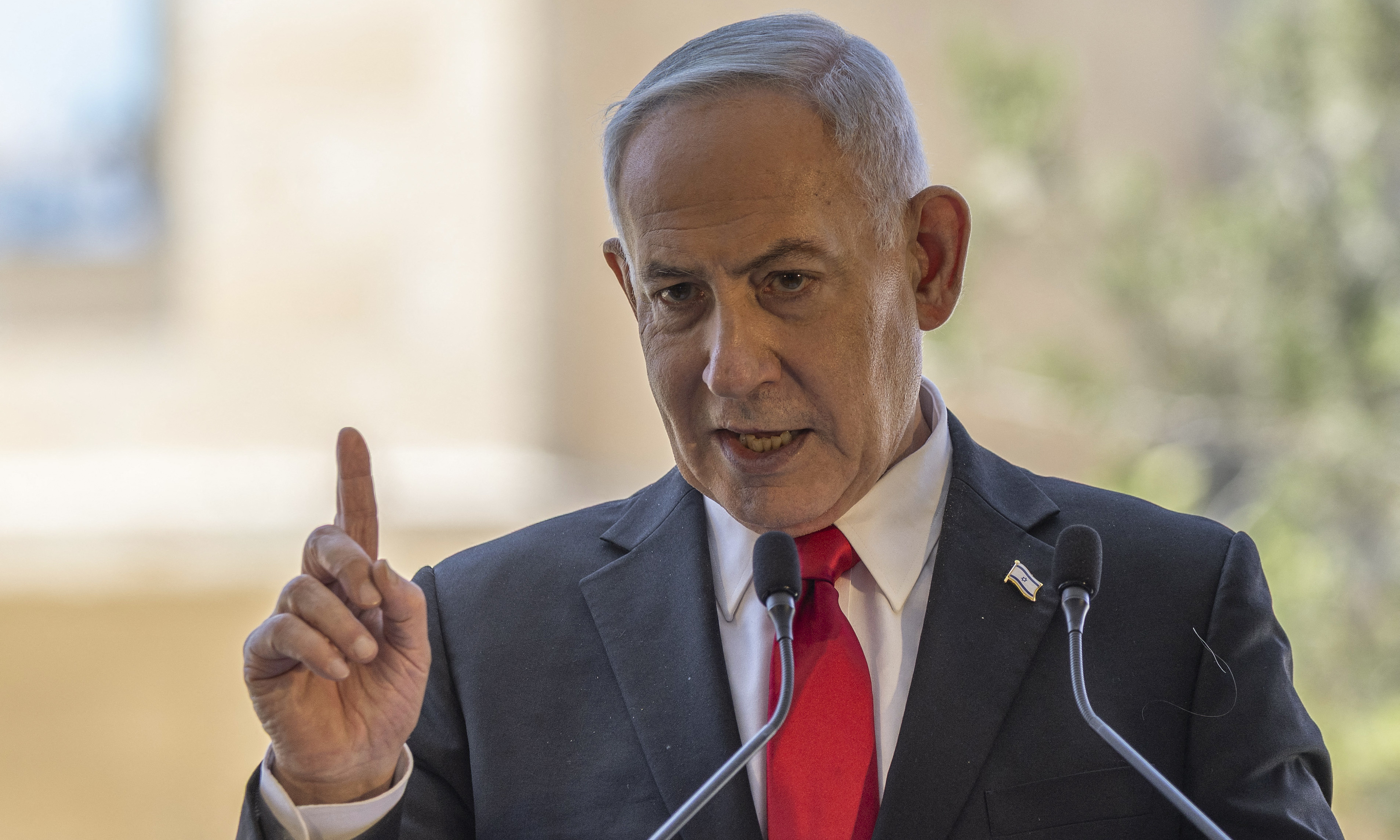 Israeli prime minister threatens powerful blows if 'enemies attack'