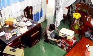 Man tricks bride out of wedding room to steal gift money