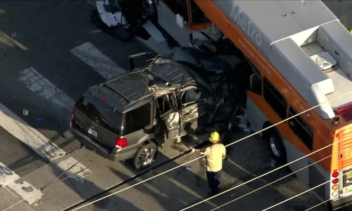 SUV crashes into bus, three dead