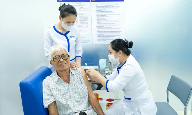 Can older adults receive three vaccines simultaneously?