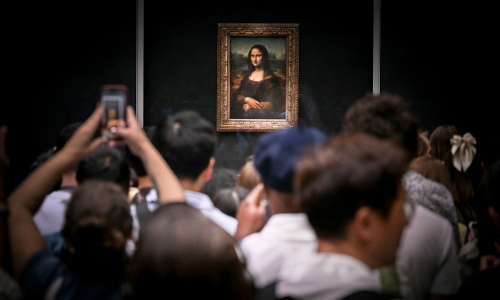 Two men arrested for pasting pictures in Mona Lisa exhibition hall