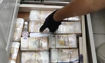 Mafia hides hundreds of stacks of cash in walls, under floors