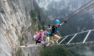 Heart-stopping climb on the world's highest 'Sky Ladder' in China