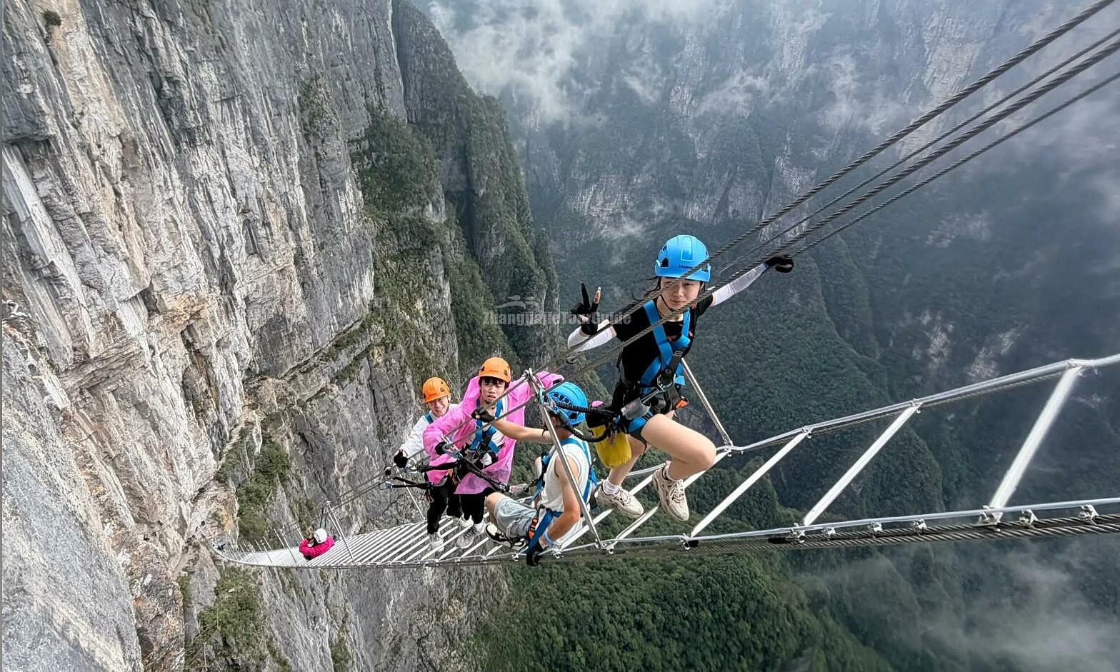 Heart-stopping climb on the world's highest 'Sky Ladder' in China